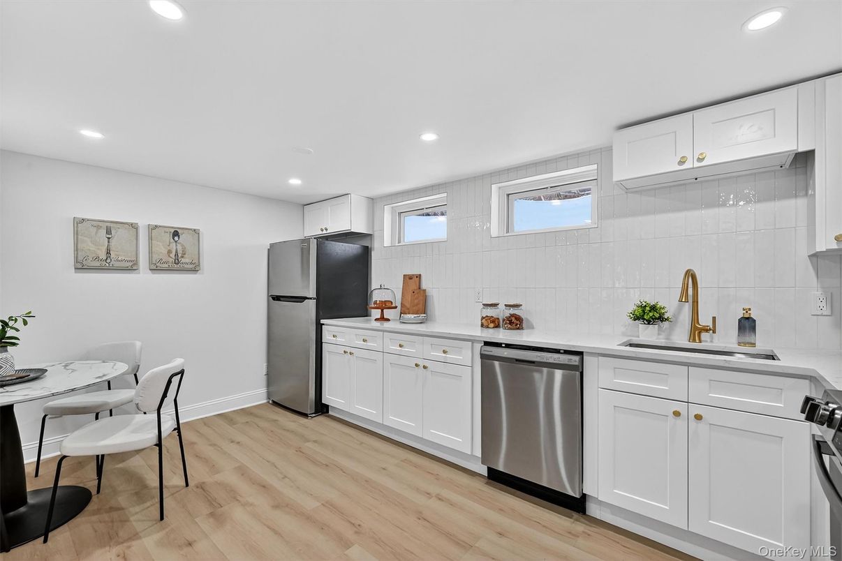 Dining room, Interior, Kitchen, Recessed Lighting, Stainless Steel Appliances, Wood Texture Flooring