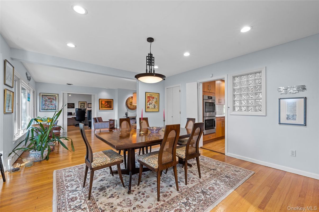 Dining room, Interior, Pendant Lights, Recessed Lighting, Stainless Steel Appliances, Wood Texture Flooring