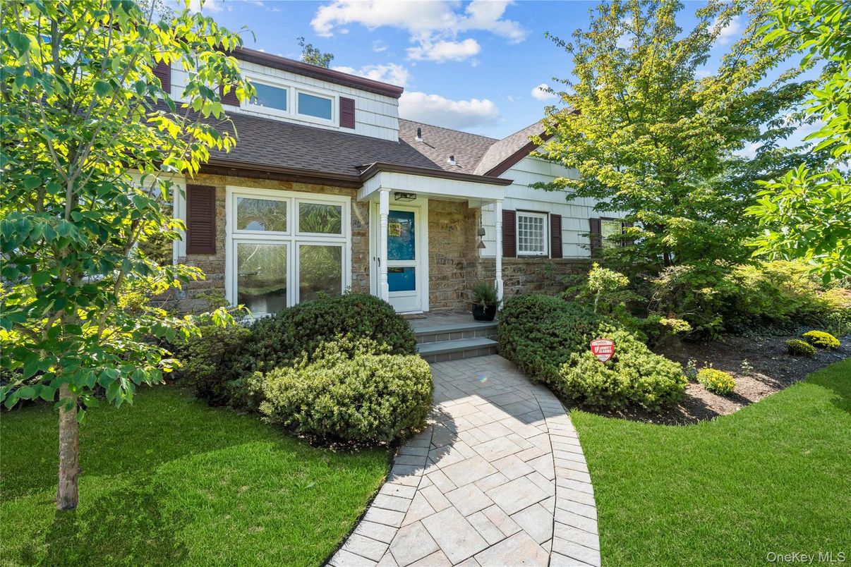 Exterior, Facade, Brick Facade, Cape Cod