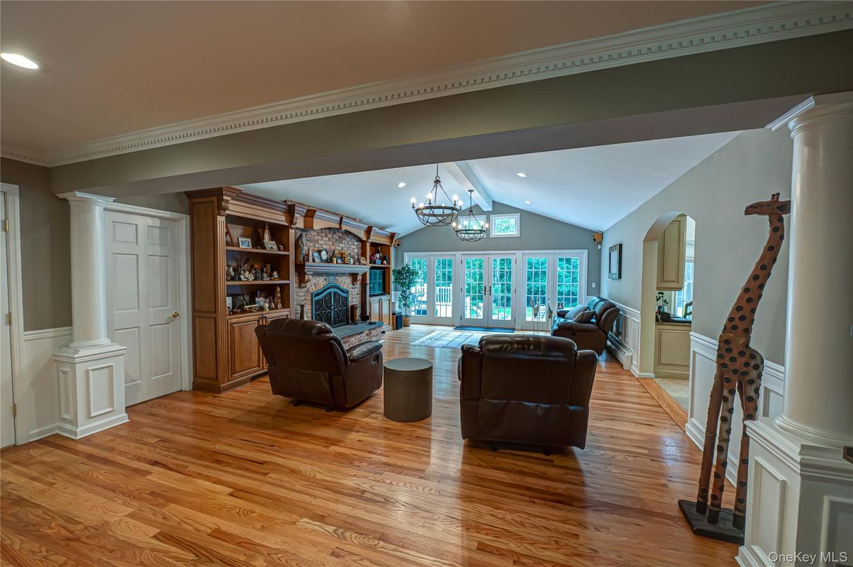 Chandelier, Fireplace, Interior, Living room, Recessed Lighting, Wood Texture Flooring