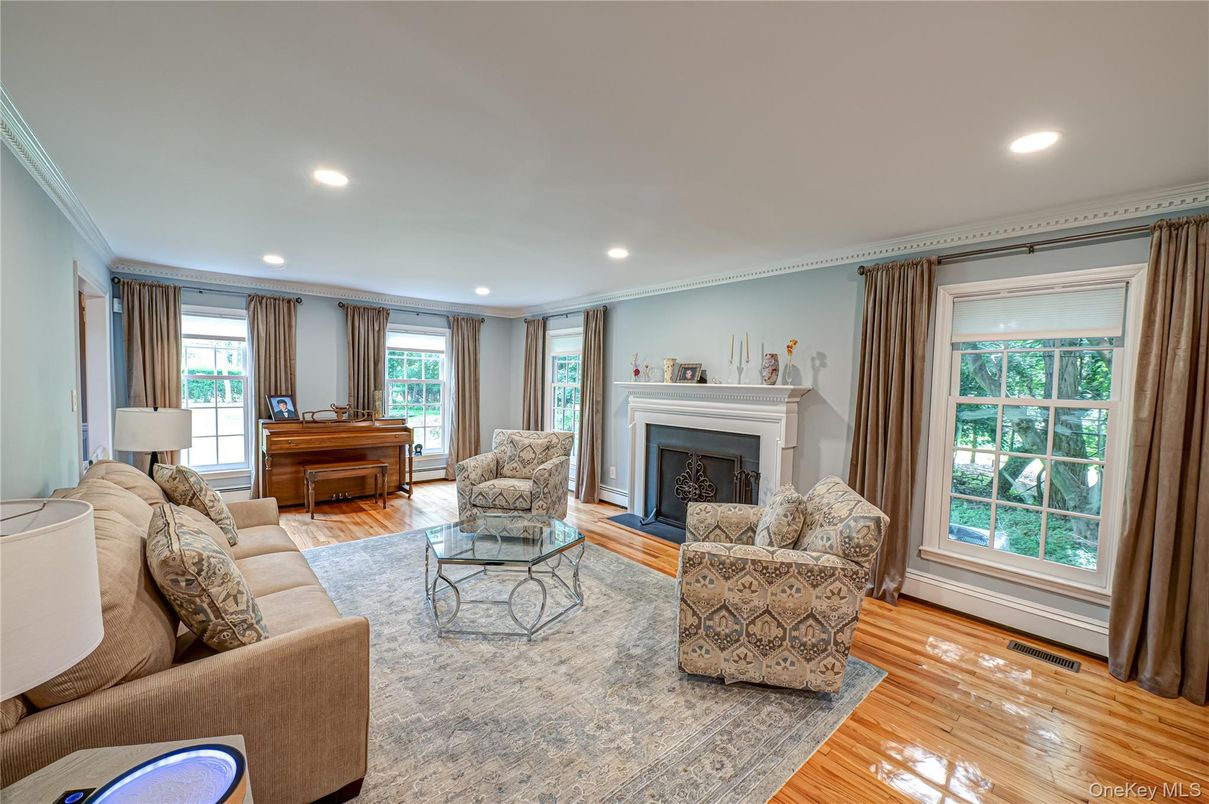 Fireplace, Interior, Living room, Piano, Recessed Lighting, Wood Texture Flooring