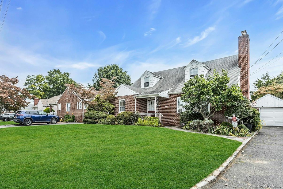 Exterior, Facade, Brick Facade, Cape Cod