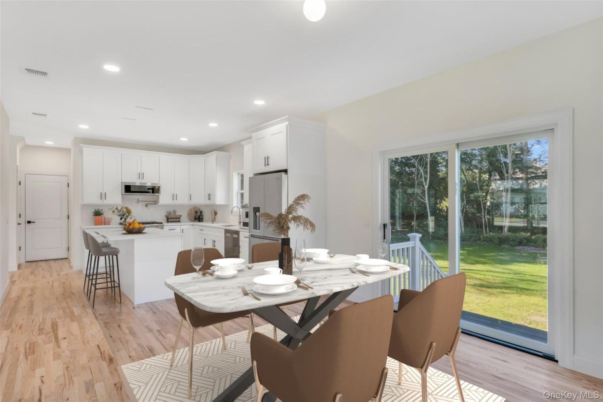Dining room, Interior, Kitchen, Recessed Lighting, Stainless Steel Appliances, Wood Texture Flooring