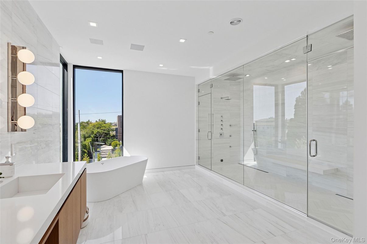 Bathroom, Free Standing Baths, Glass Shower, Interior, Marble, Marble Walls, Recessed Lighting