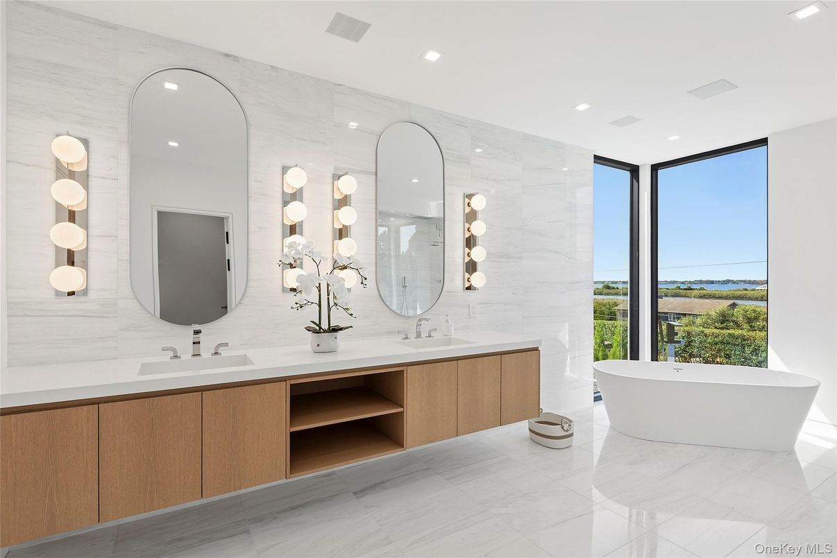 Bathroom, Dual Sink Vanities, Free Standing Baths, Interior, Marble, Marble Walls, Recessed Lighting, Water