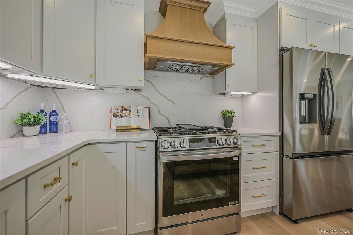 Interior, Kitchen, Marble Walls, Stainless Steel Appliances, Wood Texture Flooring
