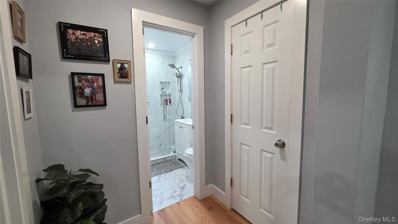 Bathroom, Glass Shower, Interior, Marble, Marble Walls, Wood Texture Flooring