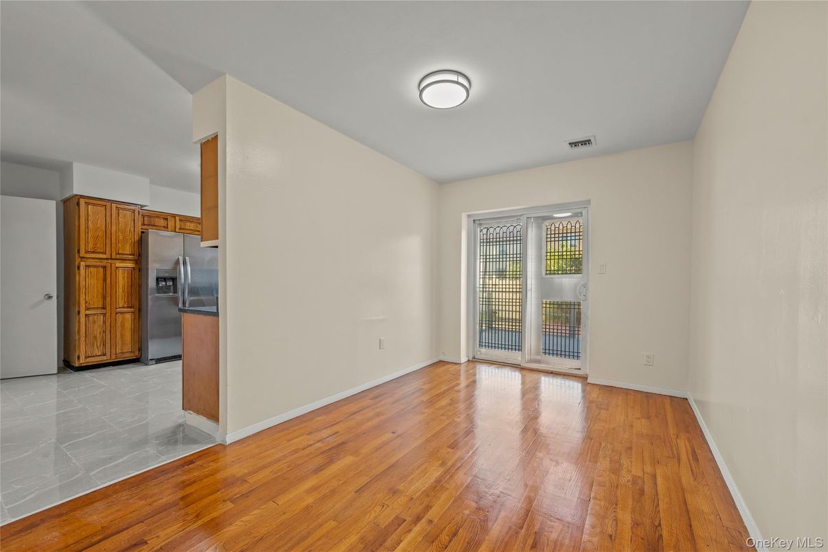 Empty room, Interior, Kitchen, Stainless Steel Appliances, Wood Texture Flooring