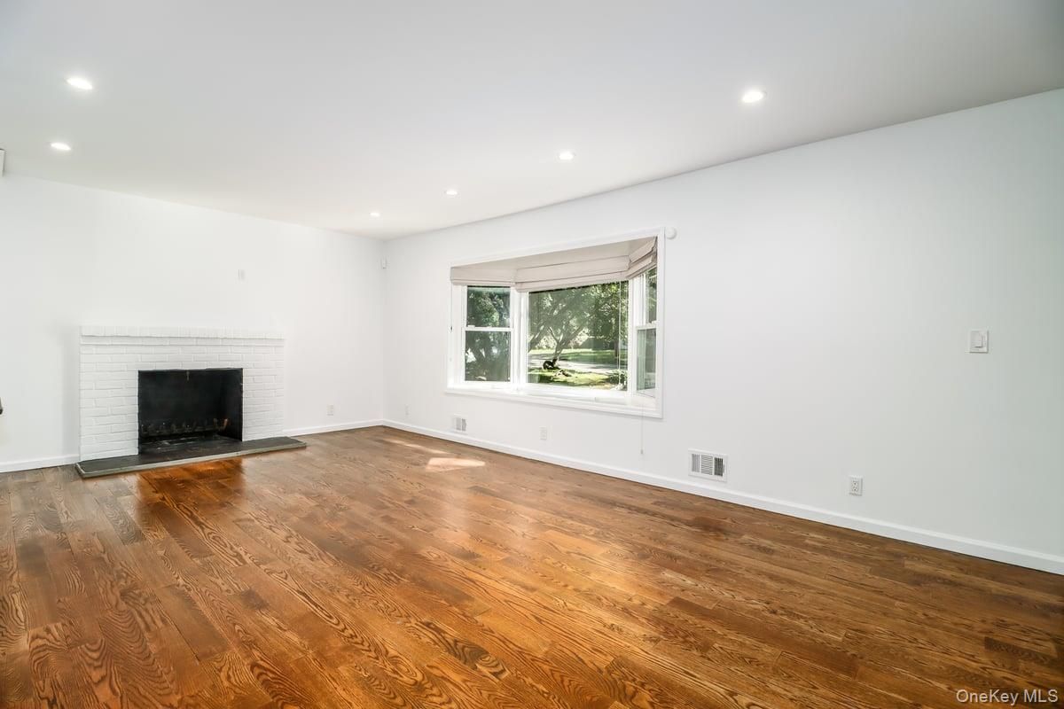 Empty room, Fireplace, Interior, Recessed Lighting, Wood Texture Flooring