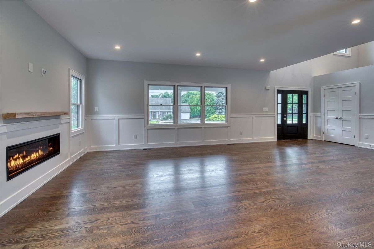 Empty room, Fireplace, Interior, Recessed Lighting, Wood Texture Flooring