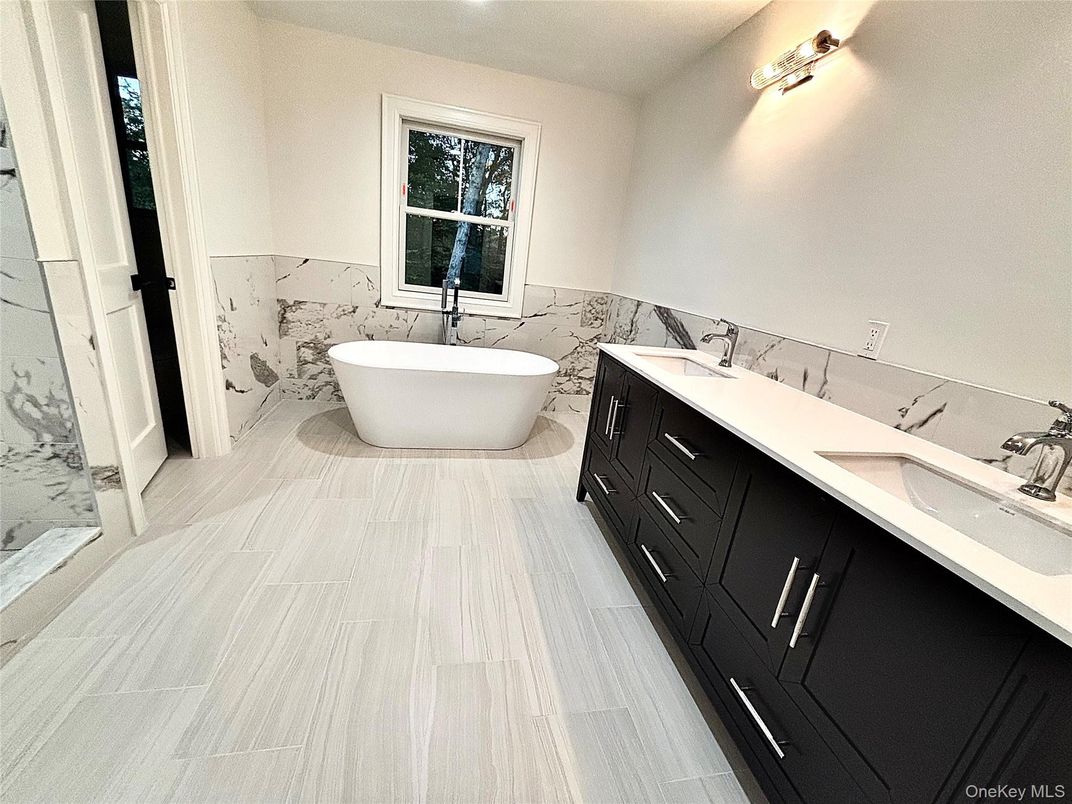 Bathroom, Dual Sink Vanities, Free Standing Baths, Interior, Marble, Marble Walls