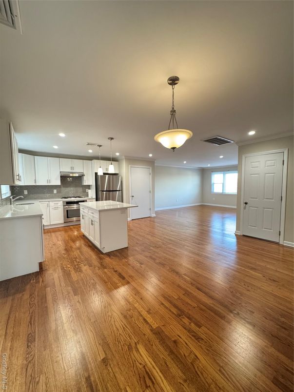 Interior, Kitchen, Pendant Lights, Recessed Lighting, Stainless Steel Appliances, Wood Texture Flooring
