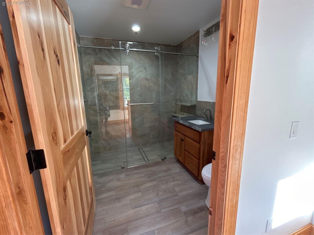 Bathroom, Glass Shower, Interior, Recessed Lighting, Wood Texture Flooring