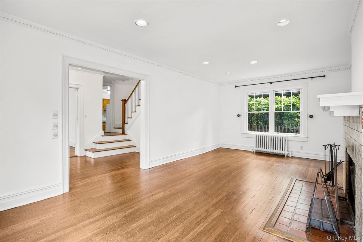 Empty room, Fireplace, Interior, Recessed Lighting, Wood Texture Flooring