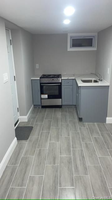 Interior, Kitchen, Recessed Lighting, Washer, Wood Texture Flooring