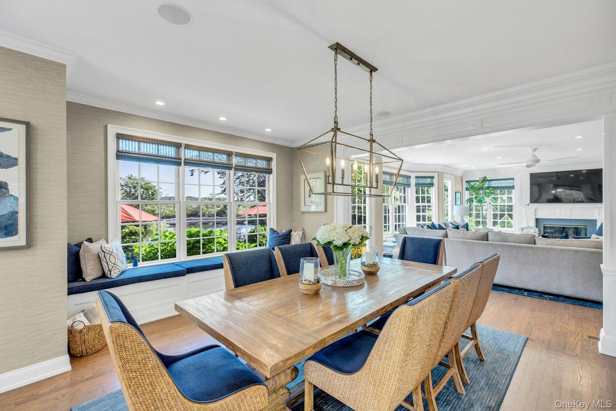 Dining room, Fireplace, Interior, Living room, Pendant Lights, Recessed Lighting, Wood Texture Flooring