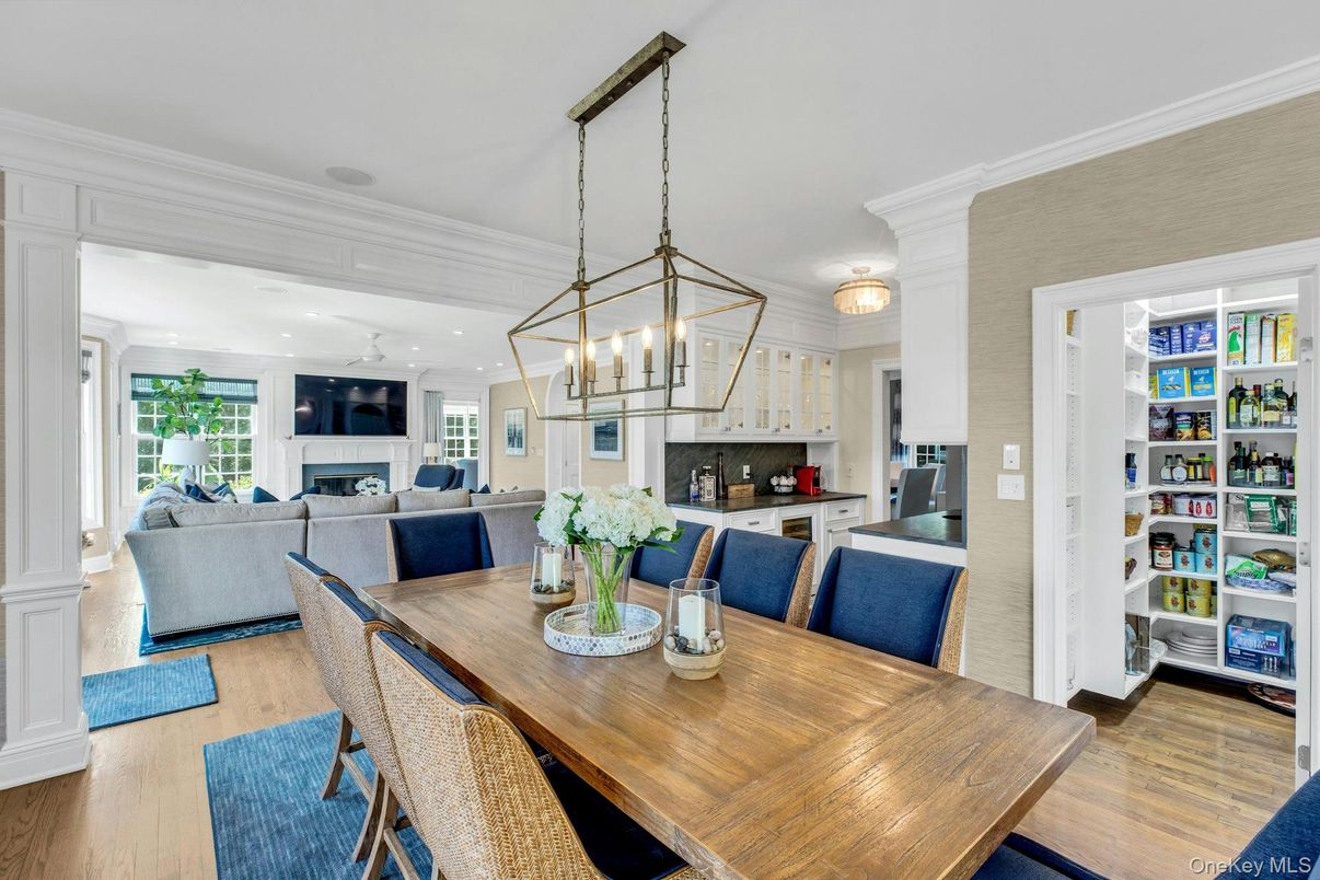 Dining room, Fireplace, Interior, Kitchen, Living room, Pendant Lights, Recessed Lighting, Stainless Steel Appliances, Wood Texture Flooring