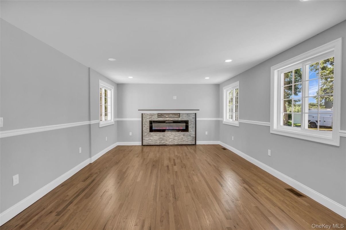 Empty room, Fireplace, Interior, Recessed Lighting, Wood Texture Flooring