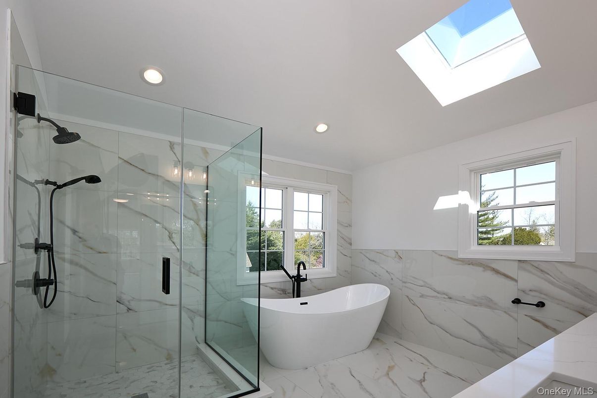Bathroom, Free Standing Baths, Glass Shower, Interior, Marble, Marble Walls, Recessed Lighting
