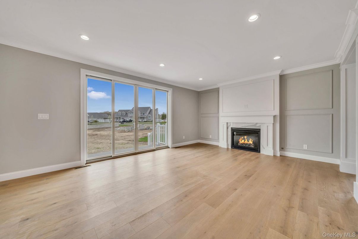 Empty room, Fireplace, Interior, Recessed Lighting, Wood Texture Flooring