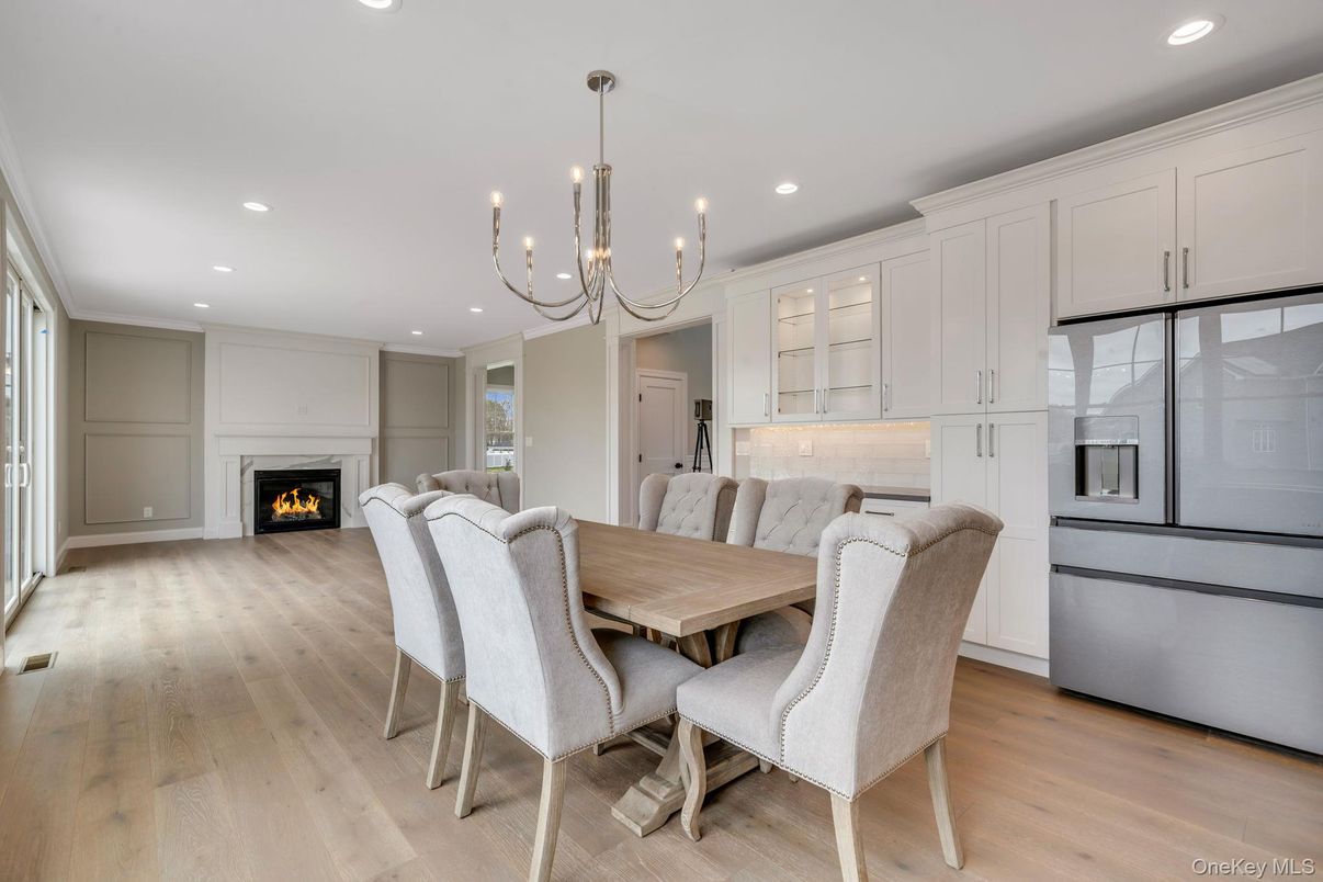 Chandelier, Dining room, Fireplace, Interior, Recessed Lighting, Wood Texture Flooring