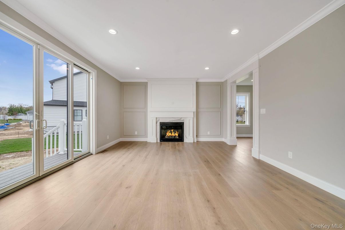 Empty room, Fireplace, Interior, Recessed Lighting, Wood Texture Flooring