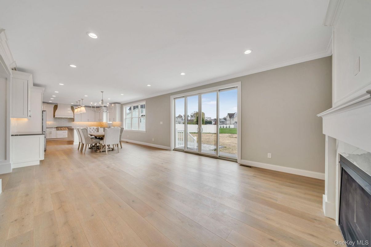 Dining room, Fireplace, Interior, Kitchen, Pendant Lights, Recessed Lighting, Wood Texture Flooring