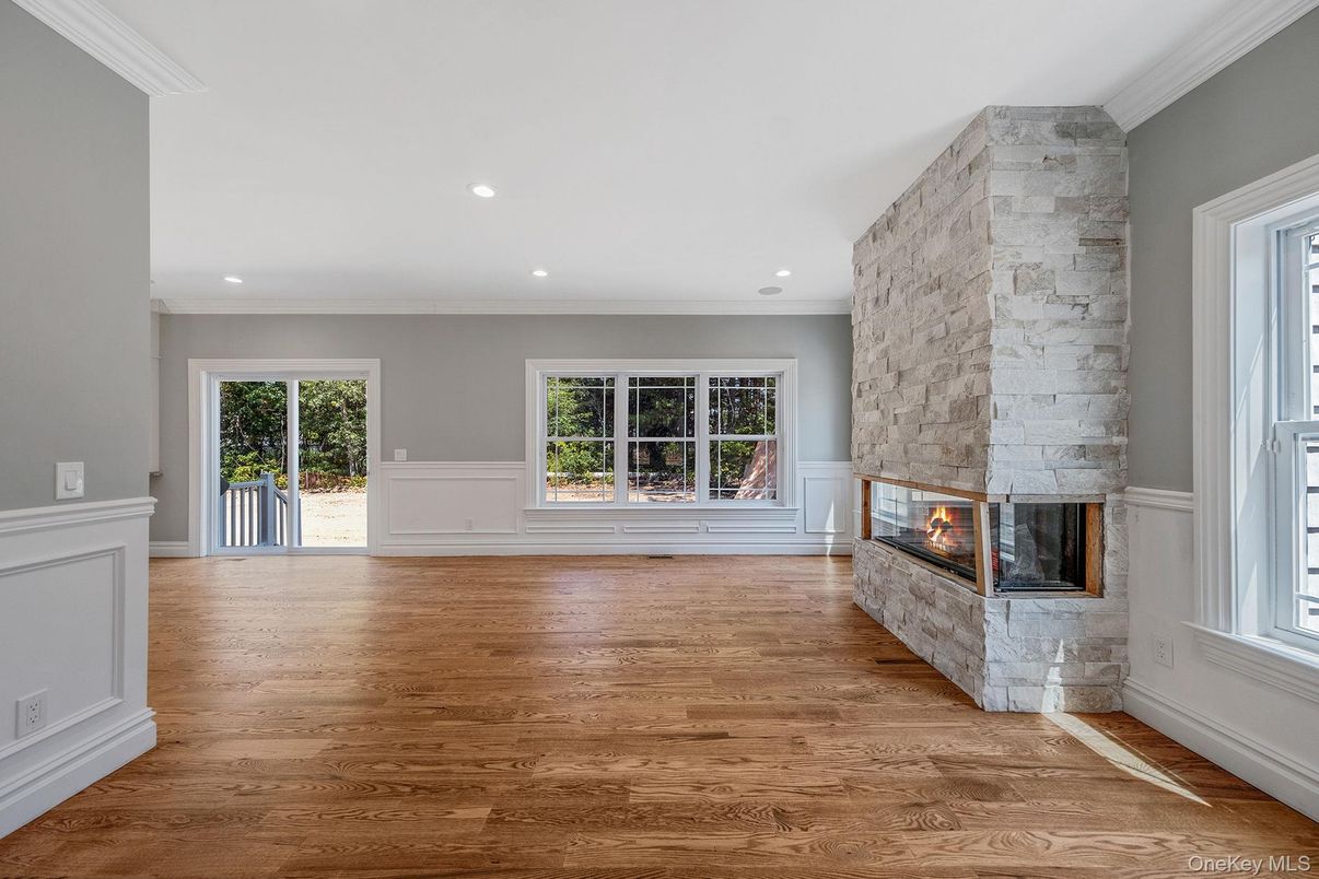 Empty room, Fireplace, Interior, Recessed Lighting, Wood Texture Flooring
