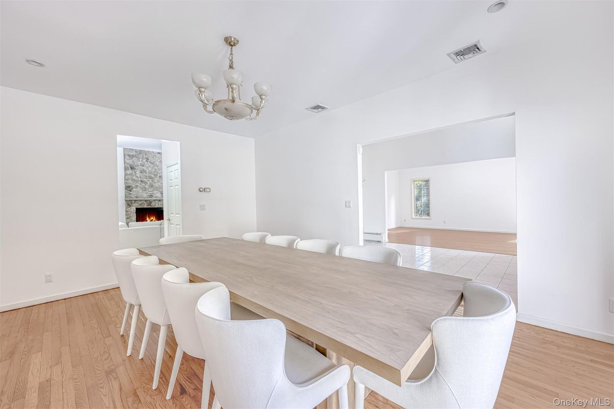 Chandelier, Dining room, Fireplace, Interior, Wood Texture Flooring