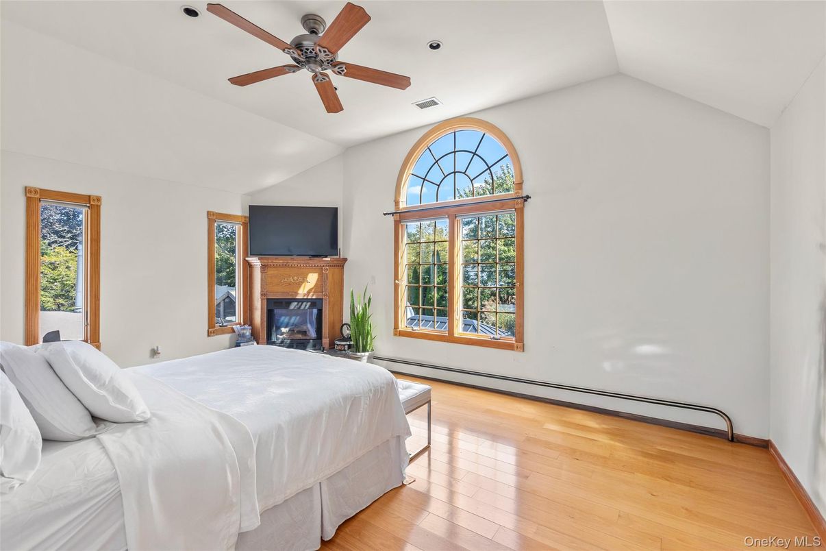 Bedroom, Fireplace, Interior, Recessed Lighting, Wood Texture Flooring