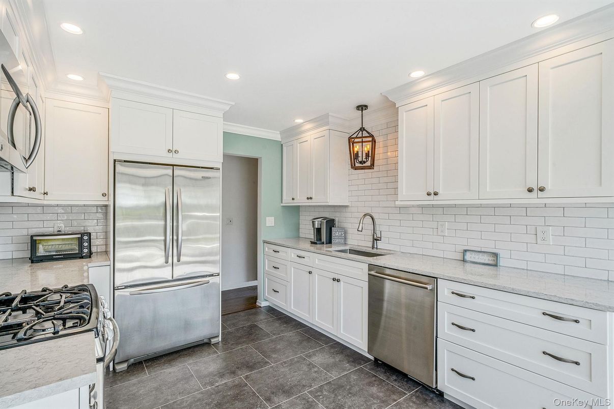 Interior, Kitchen, Pendant Lights, Recessed Lighting, Stainless Steel Appliances, Stone Walls