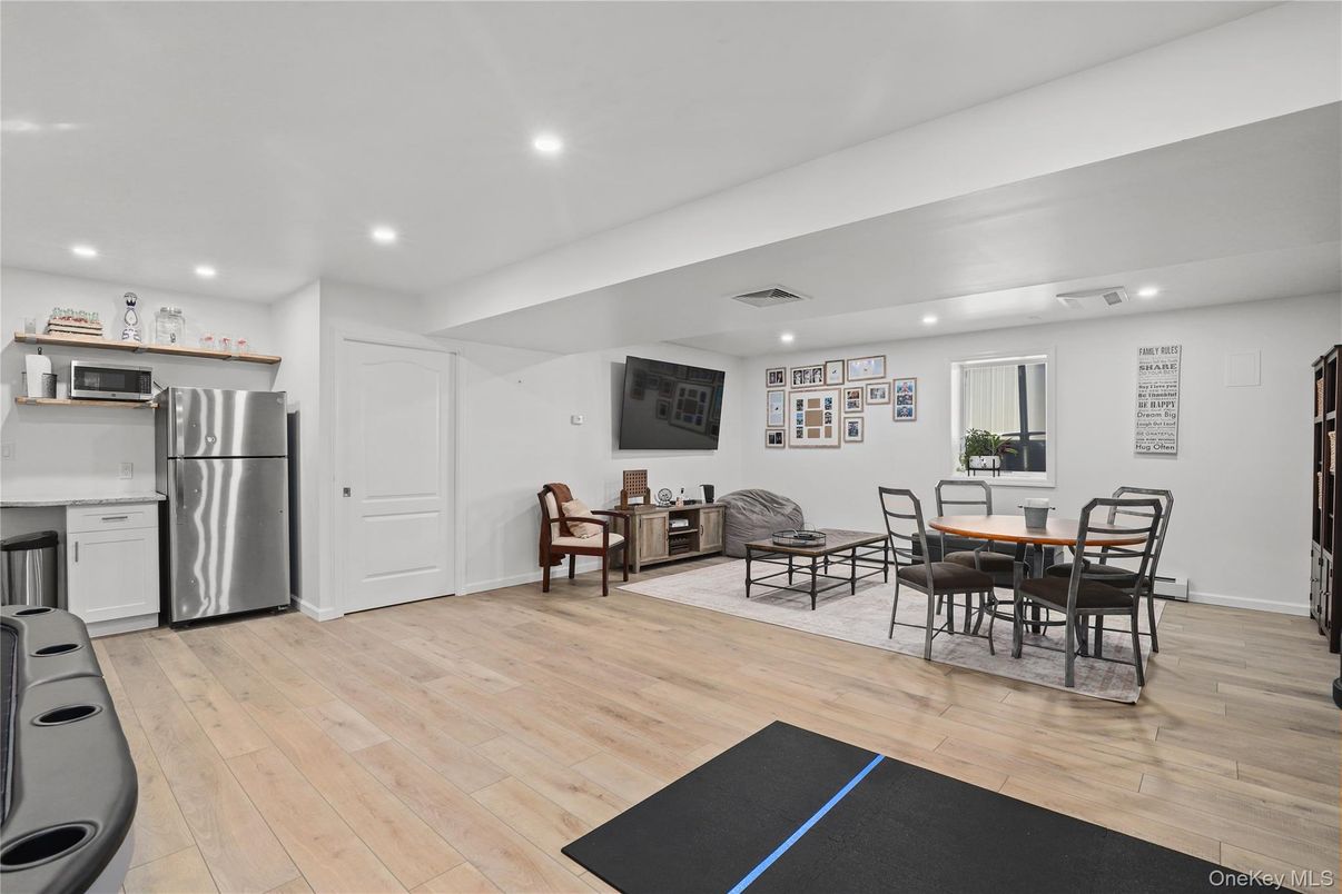 Dining room, Interior, Kitchen, Recessed Lighting, Stainless Steel Appliances, Wood Texture Flooring