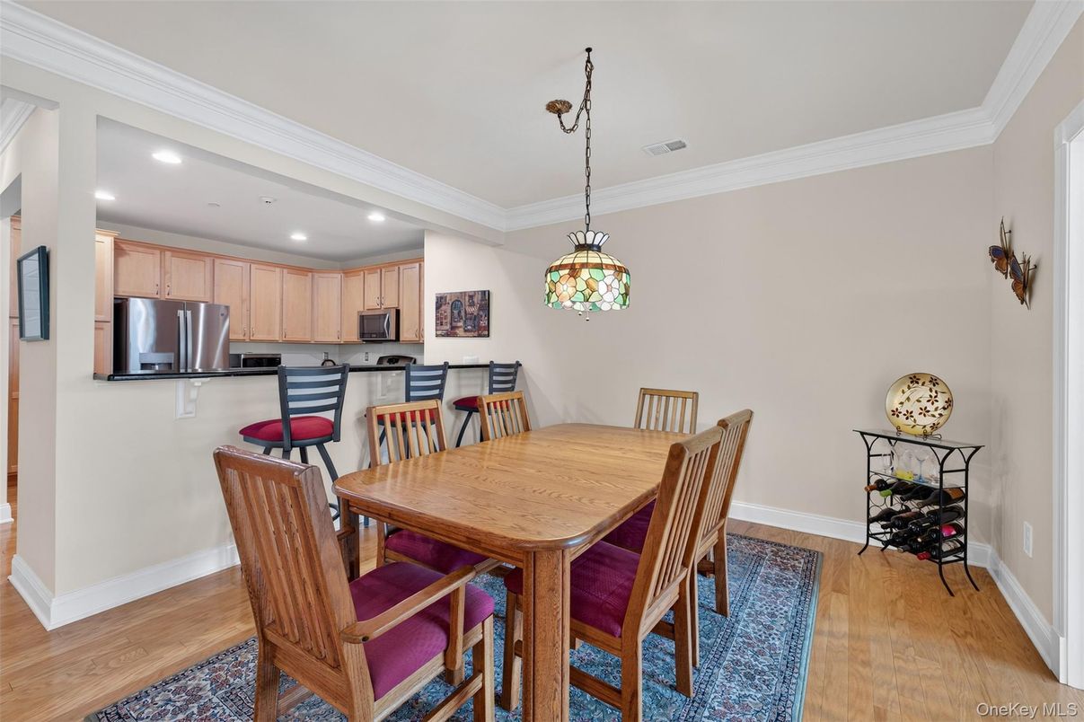 Dining room, Interior, Kitchen, Pendant Lights, Recessed Lighting, Stainless Steel Appliances, Wood Texture Flooring