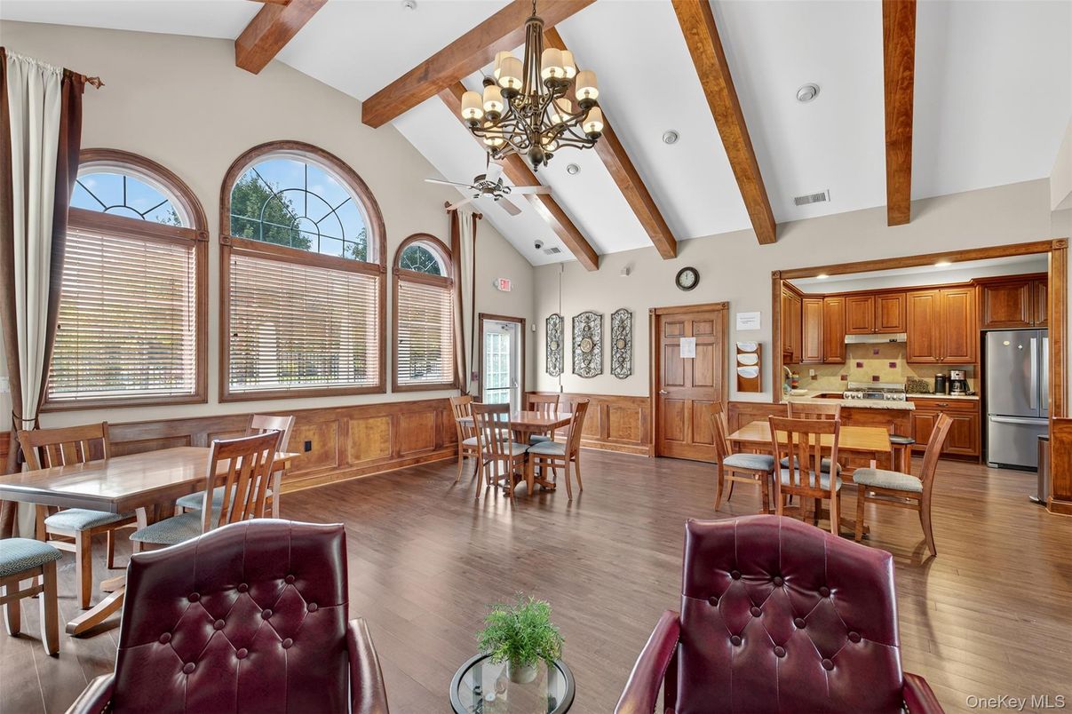 Chandelier, Dining room, Interior, Kitchen, Recessed Lighting, Stainless Steel Appliances, Wooden Beams, Wood Texture Flooring