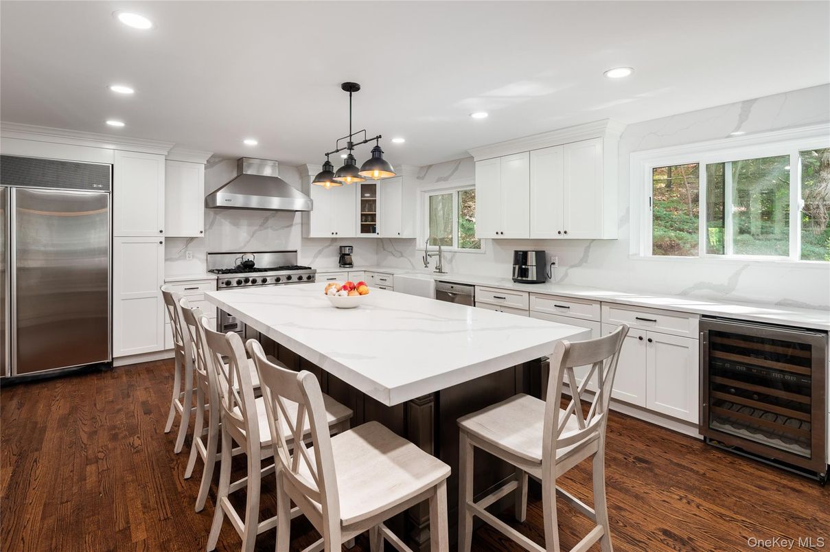Interior, Kitchen, Marble Walls, Pendant Lights, Recessed Lighting, Stainless Steel Appliances, Wood Texture Flooring