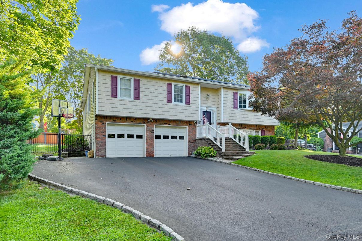 Attached, Exterior, Facade, Raised Ranch