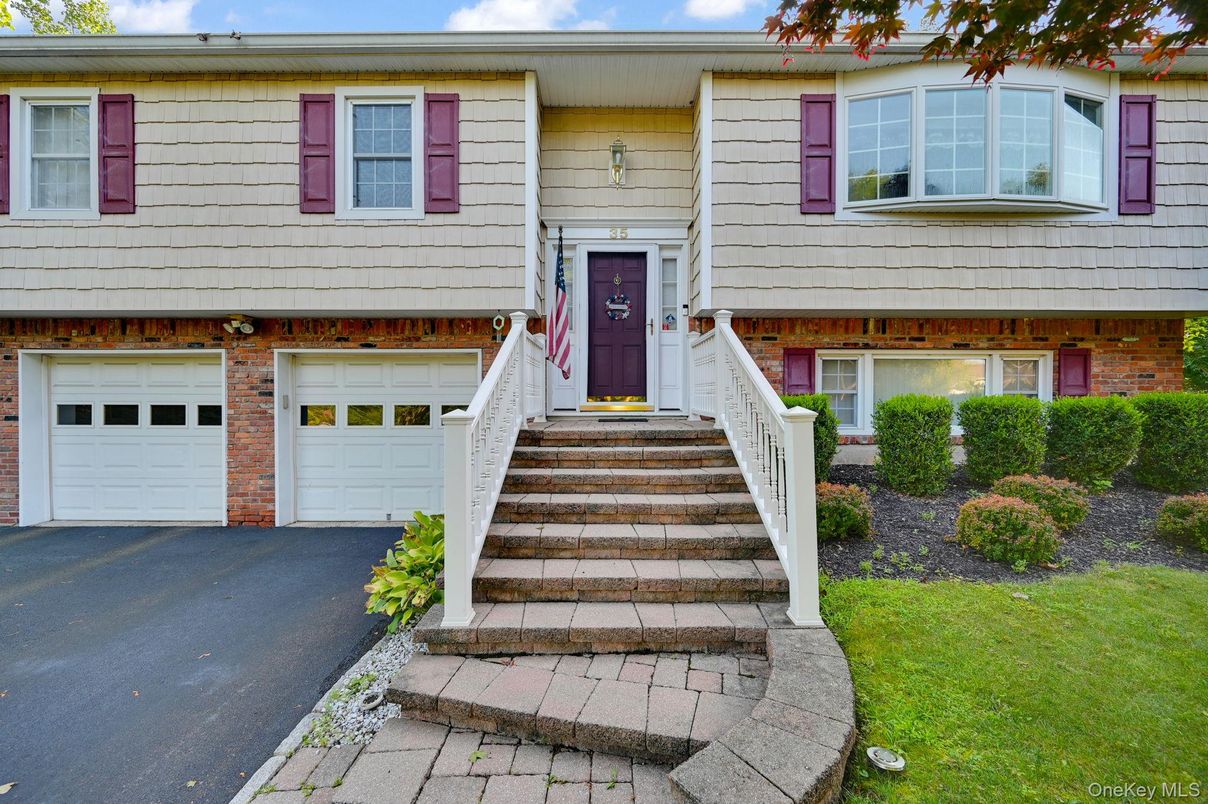 Attached, Exterior, Facade, Raised Ranch