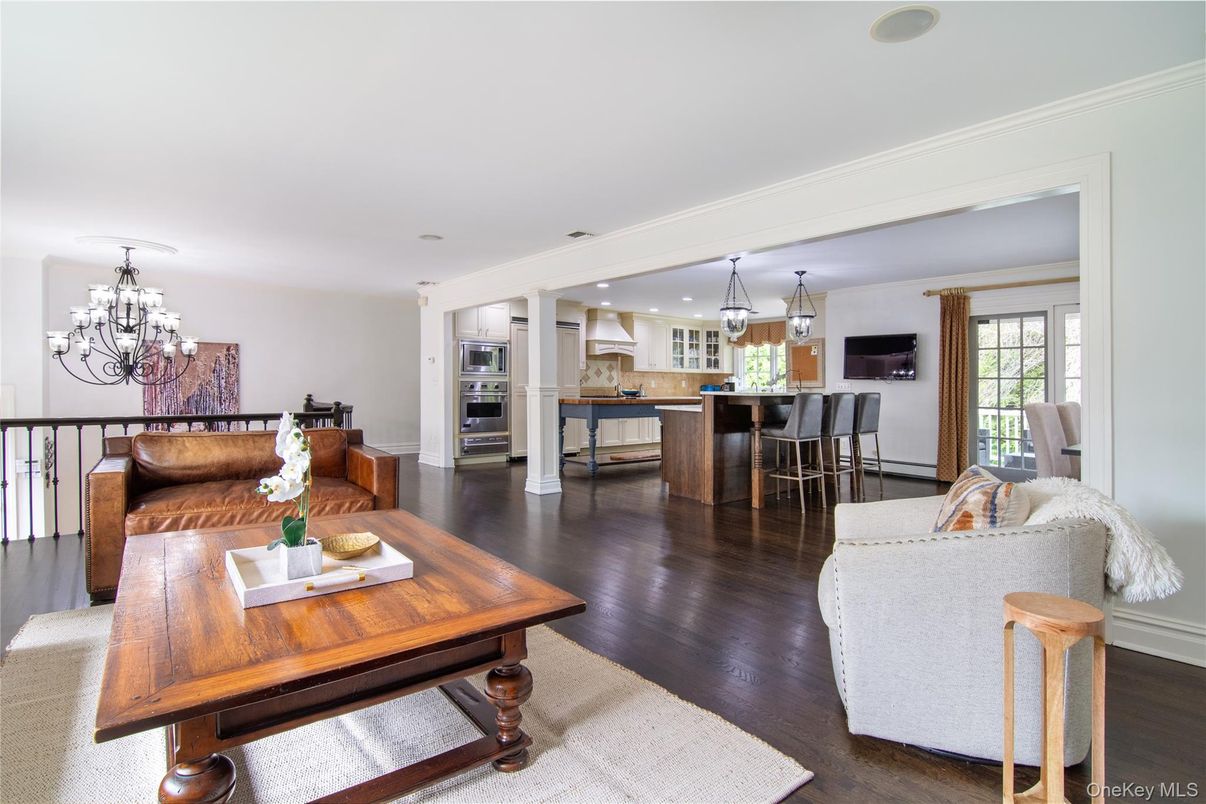 Chandelier, Dining room, Interior, Kitchen, Living room, Recessed Lighting, Stainless Steel Appliances, Wood Texture Flooring