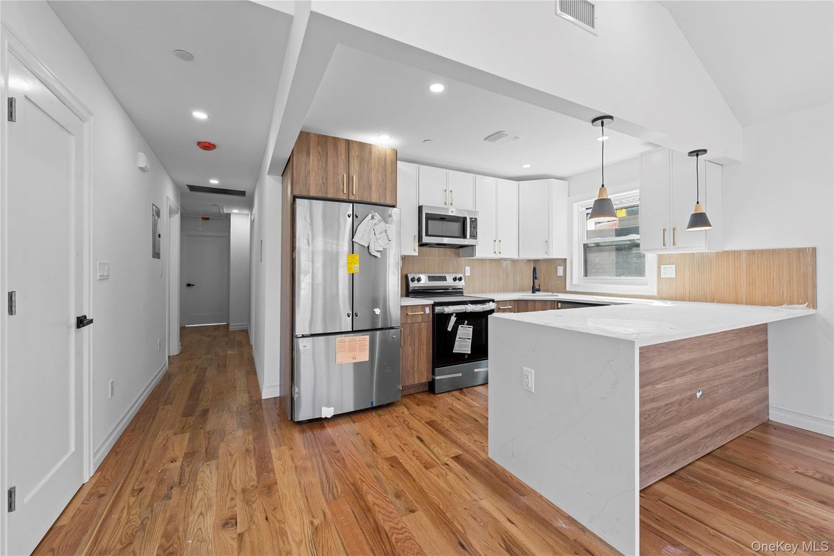 Interior, Kitchen, Pendant Lights, Recessed Lighting, Stainless Steel Appliances, Wood Texture Flooring