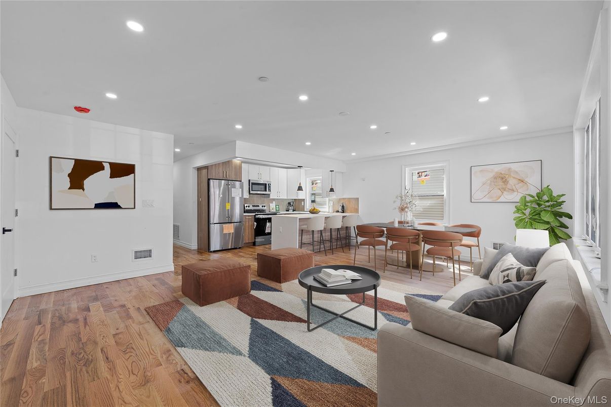 Dining room, Interior, Kitchen, Living room, Recessed Lighting, Stainless Steel Appliances, Wood Texture Flooring