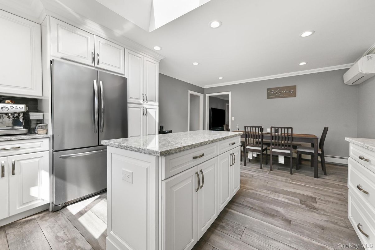 Dining room, Interior, Kitchen, Recessed Lighting, Stainless Steel Appliances, Wood Texture Flooring