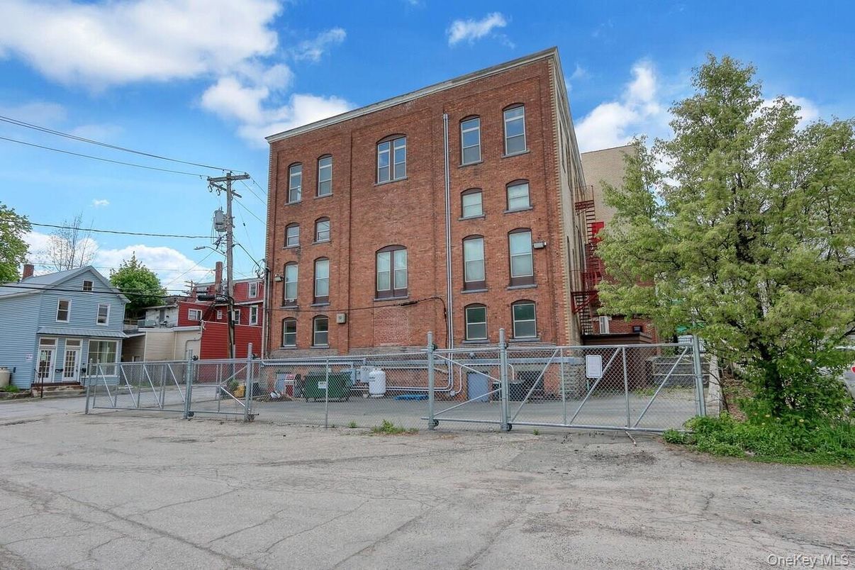 Exterior, Facade, Brick Facade, Condo Building