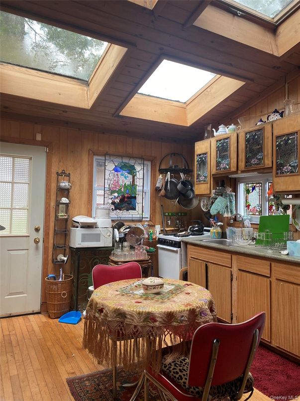 Dining room, Glass Ceilings, Interior, Kitchen, Sun Room, Wood Texture Flooring, Wooden Walls