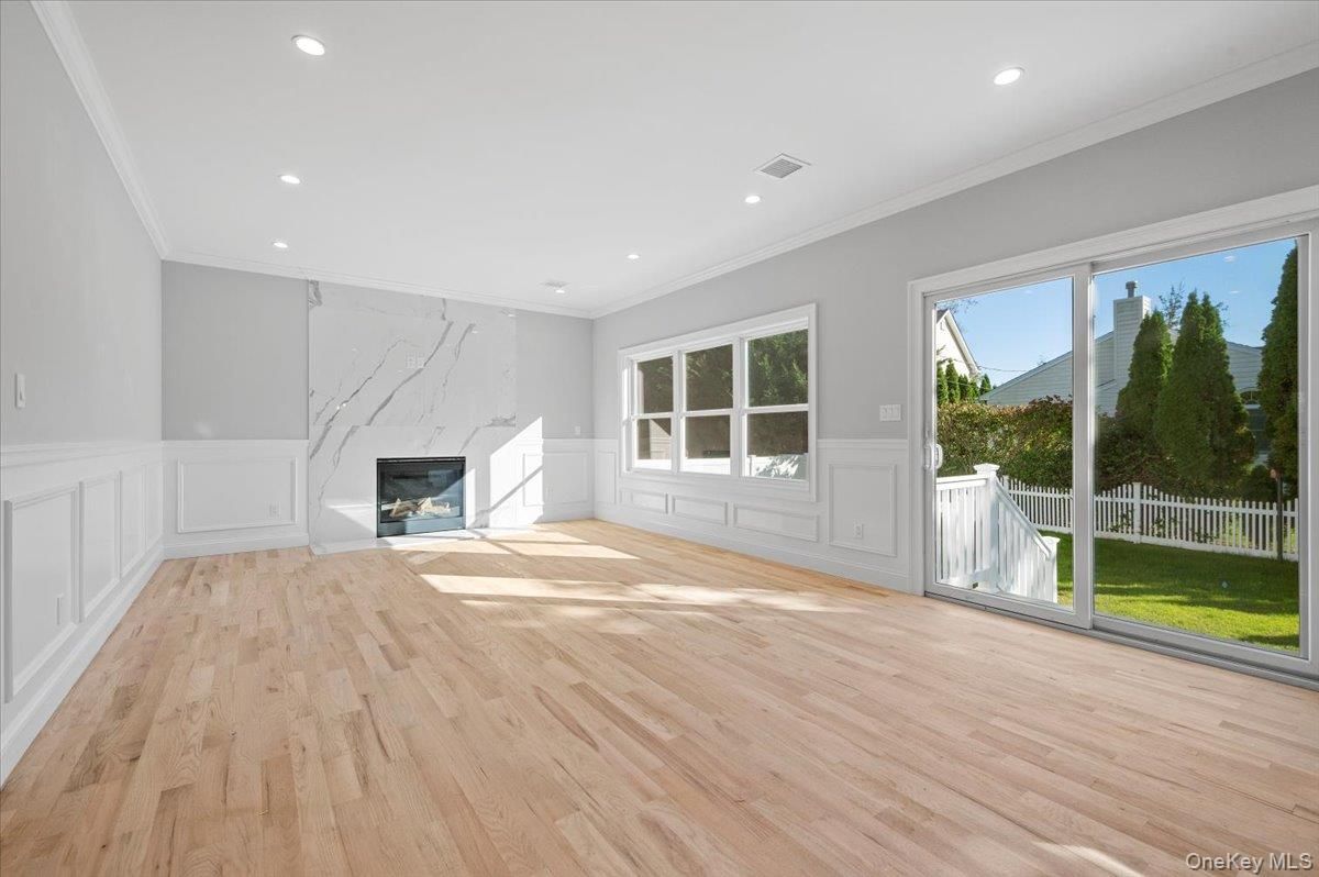 Empty room, Fireplace, Interior, Recessed Lighting, Wood Texture Flooring