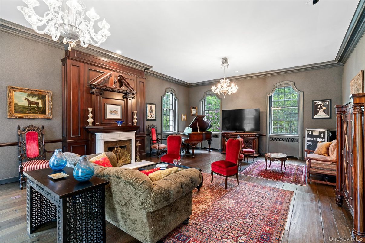 Chandelier, Fireplace, Interior, Living room, Piano, Recessed Lighting, Wood Texture Flooring