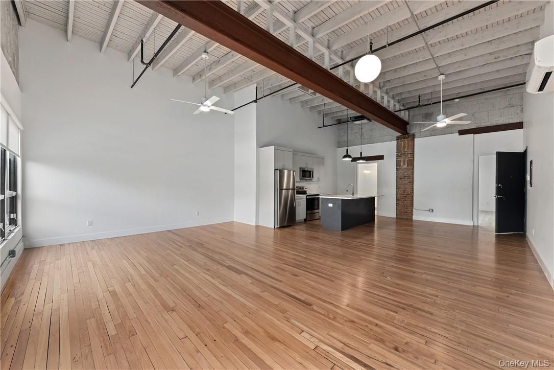 Empty room, Interior, Kitchen, Stainless Steel Appliances, Wooden Beams, Wood Texture Flooring