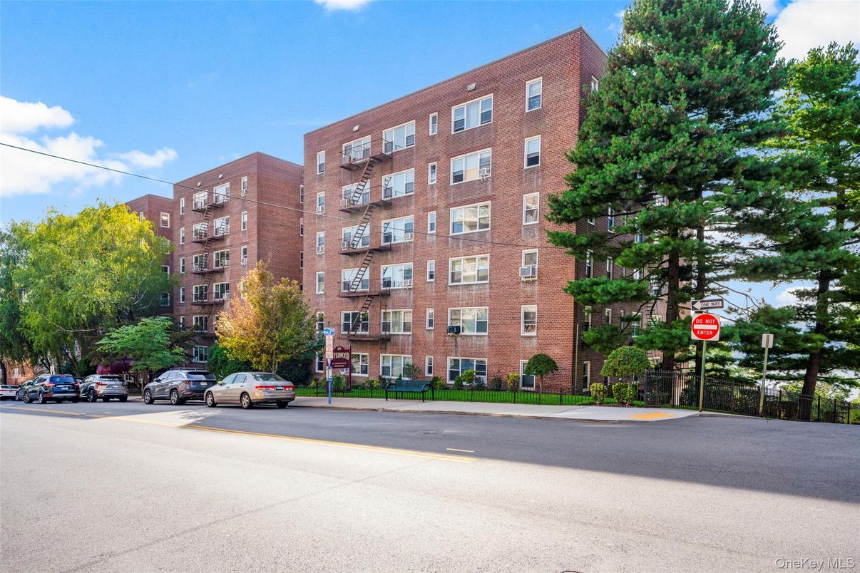 Exterior, Facade, Brick Facade, Condo Building