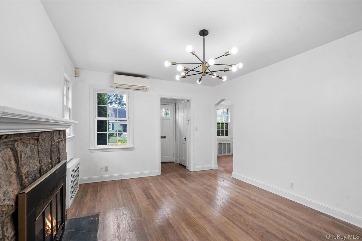 Empty room, Fireplace, Interior, Pendant Lights, Wood Texture Flooring