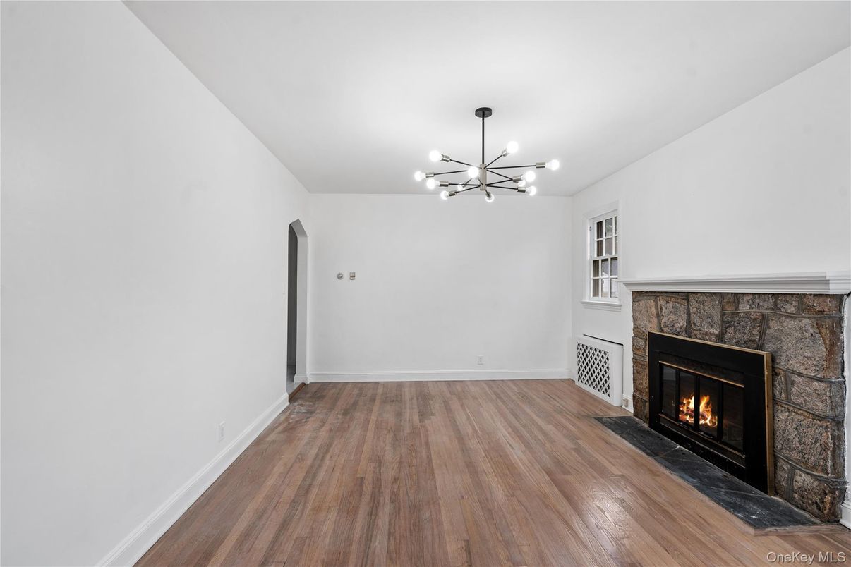 Empty room, Fireplace, Interior, Pendant Lights, Wood Texture Flooring