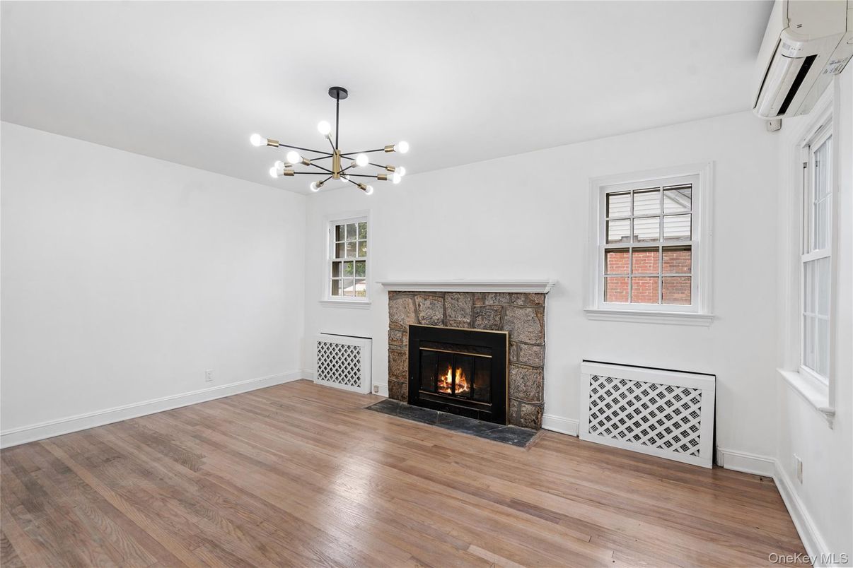 Empty room, Fireplace, Interior, Pendant Lights, Wood Texture Flooring